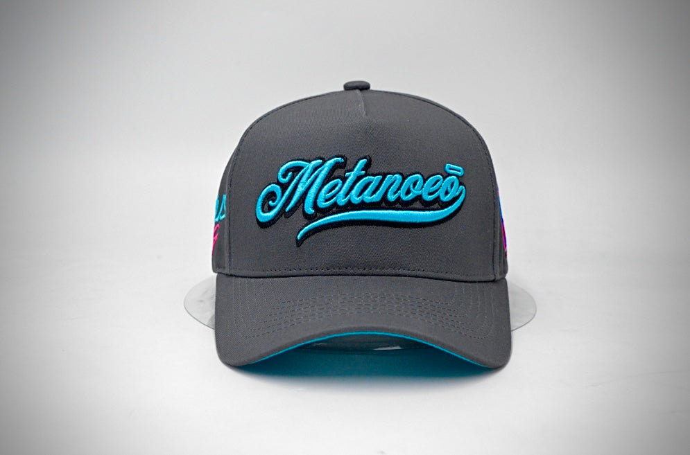 Grey & Terquoise Metanoeō 5 Panel snap back cap