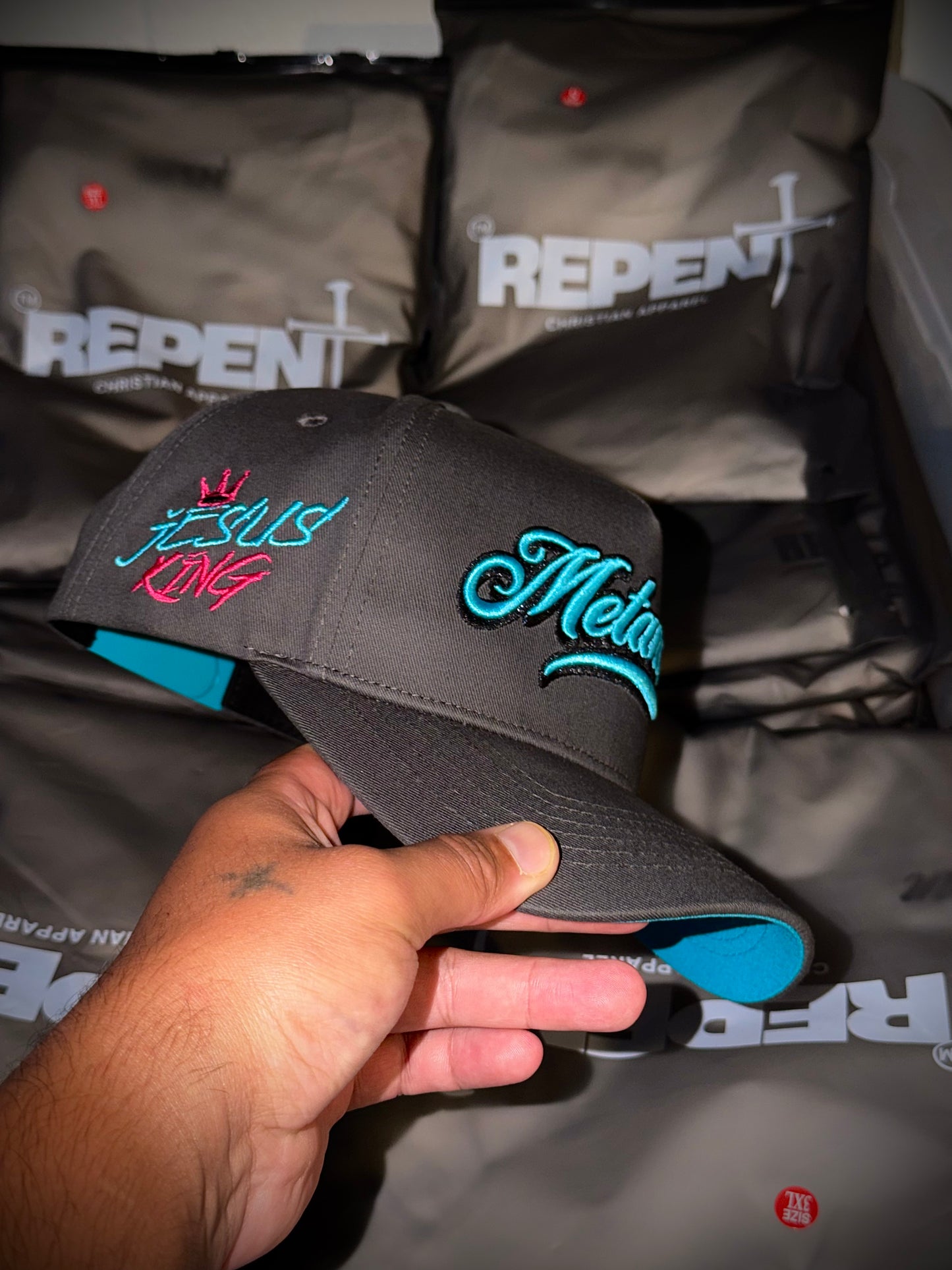 Grey & Terquoise Metanoeō 5 Panel snap back cap