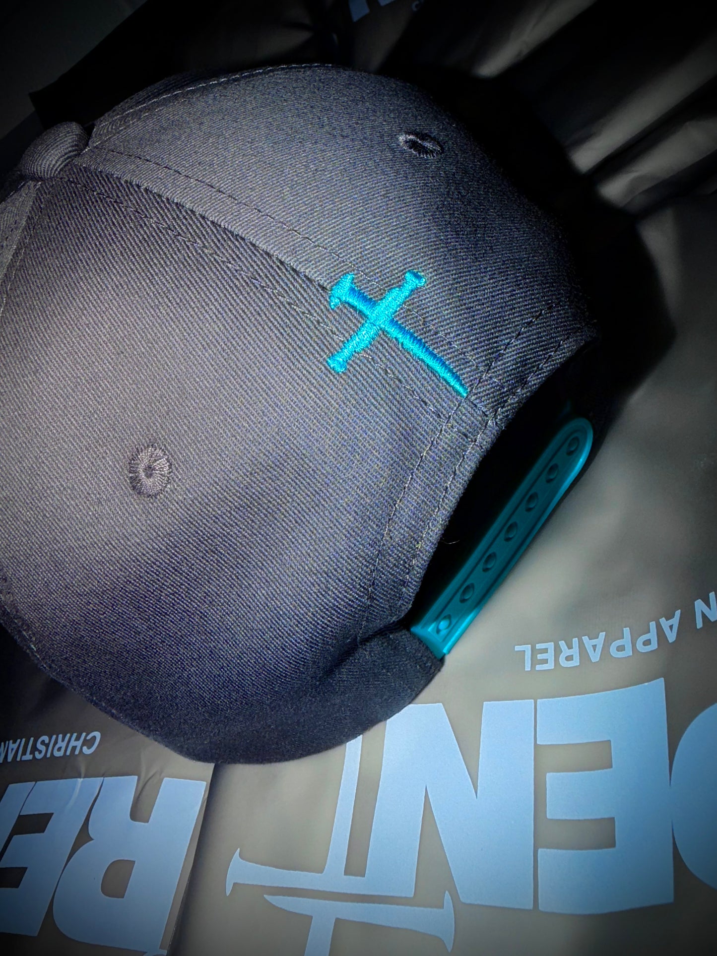 Grey & Terquoise Metanoeō 5 Panel snap back cap