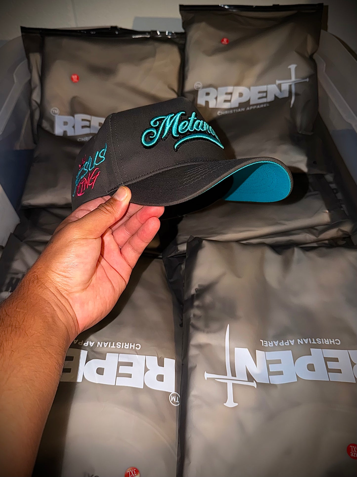 Grey & Terquoise Metanoeō 5 Panel snap back cap